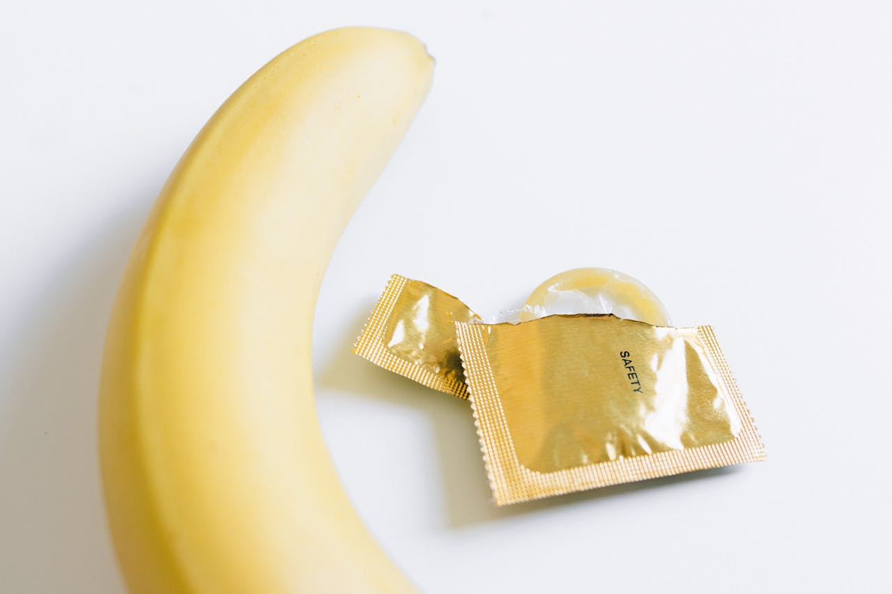 Creative image illustrating safe sex concept using a banana and a condom.